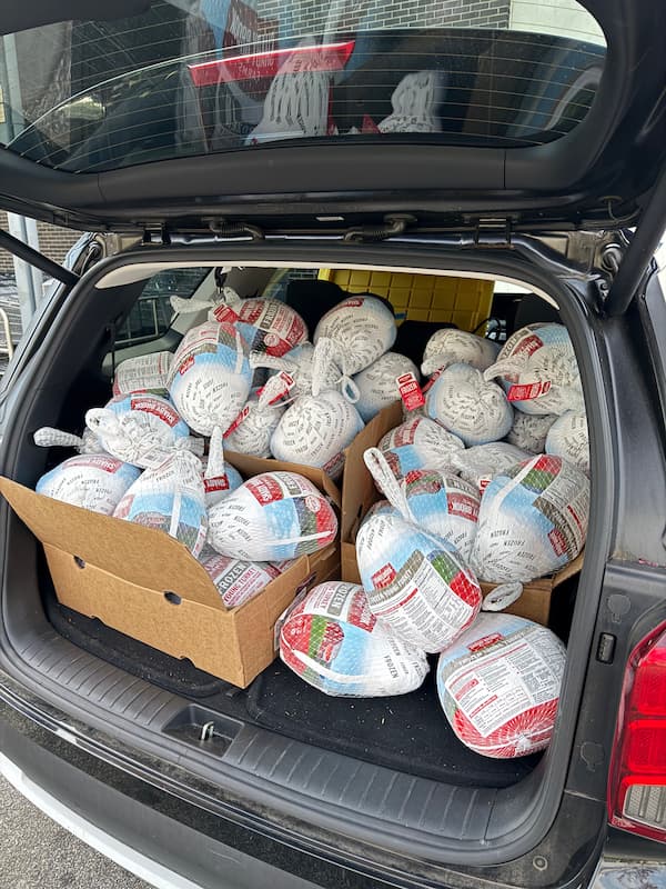 Personal injury lawyer Ross Moore distributed over 50 turkeys to the Atlanta community to combat hunger