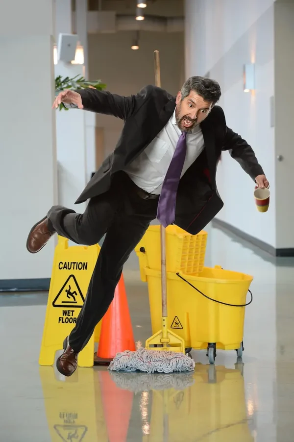 A photo of a man mid slip and fall accident.