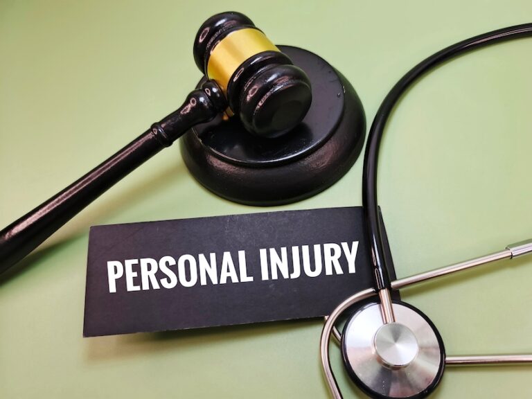 Personal injury legal representation symbolized by a gavel and a stethoscope representing medical and legal advocacy.