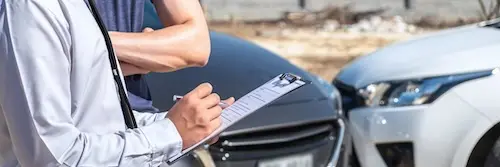 Insurance adjuster reviewing Georgia car accident claim timelines and deadlines
