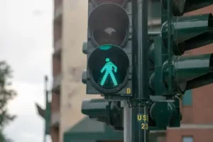 Crosswalk signal showing it’s safe to walk in Milton Georgia - reminding residents that a Milton pedestrian accident lawyer can help after accidents by protecting their rights - managing insurance issues and seeking justice.