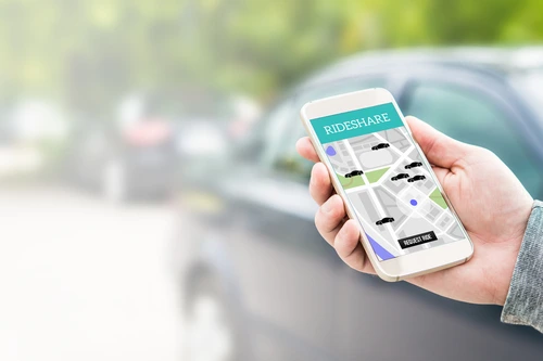 rideshare app on phone symbolizing Decatur rideshare accident lawyer