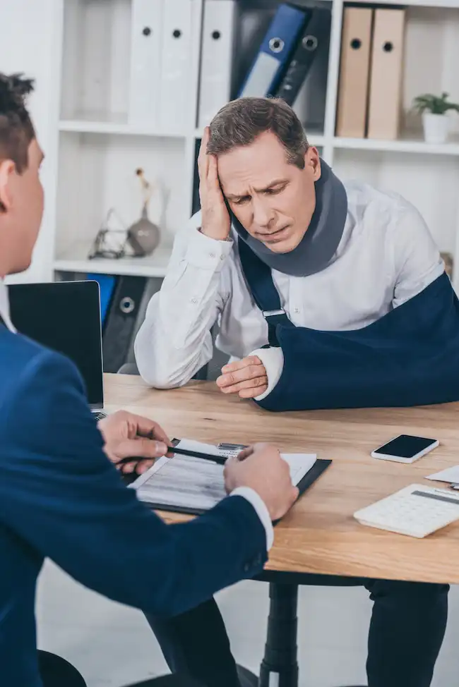 Insurance adjuster presenting a car accident settlement offer to an accident victim in Georgia